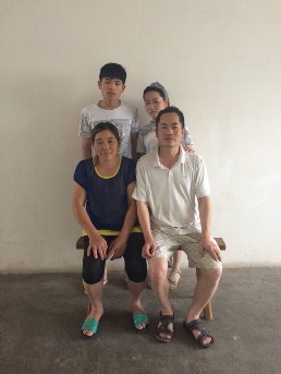 文昌社区周清翠全家福相片.JPG